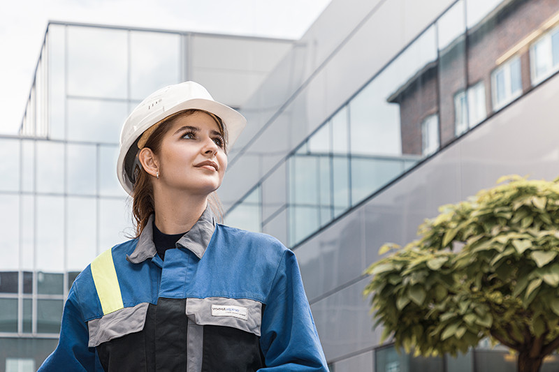 voestalpine employee looking into the distance.