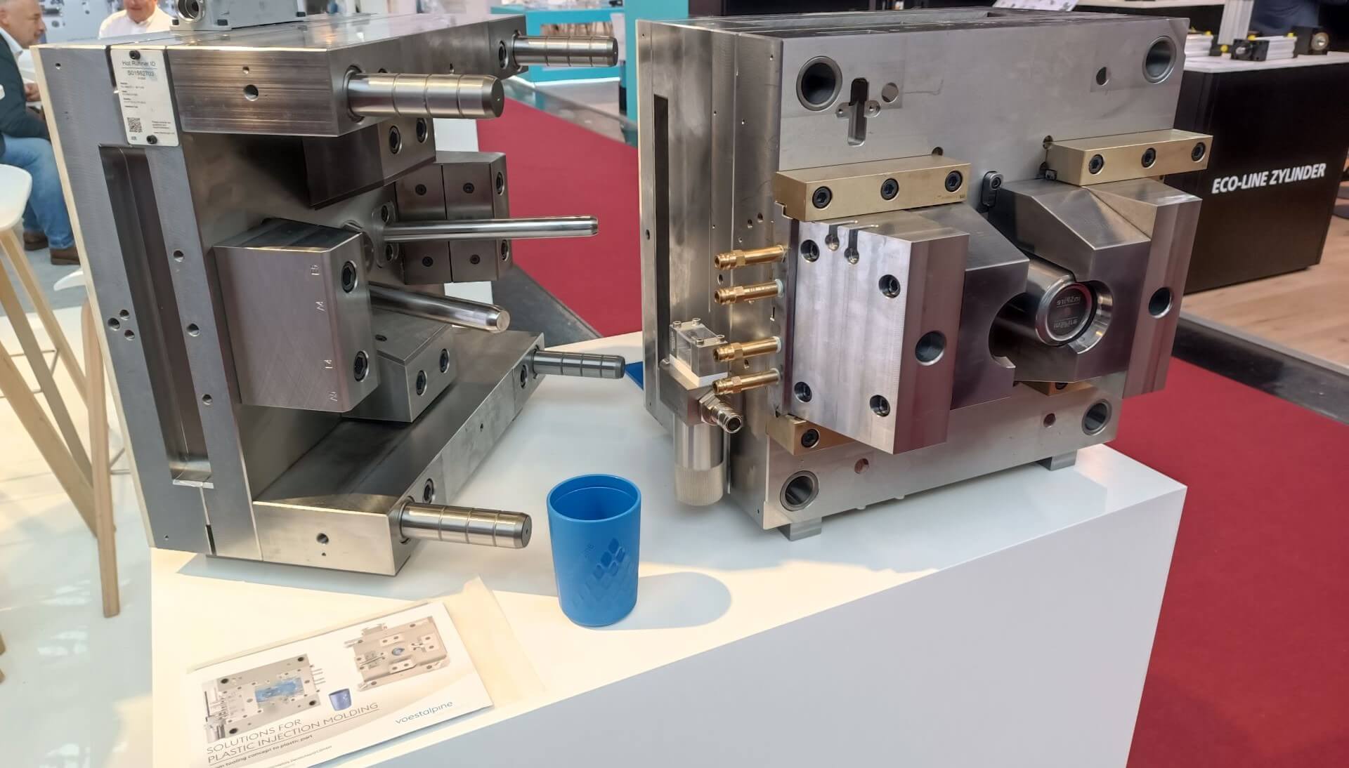 voestalpine mold and coffee cup at Fakuma 2024