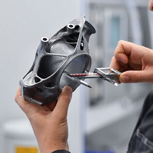 Person working on voestalpine steel tool